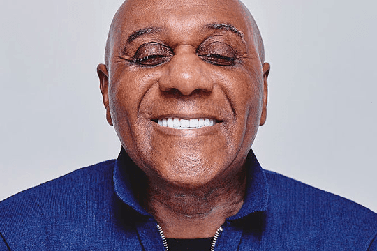 IU dental implants for Carlos (close up, smiling) landscape