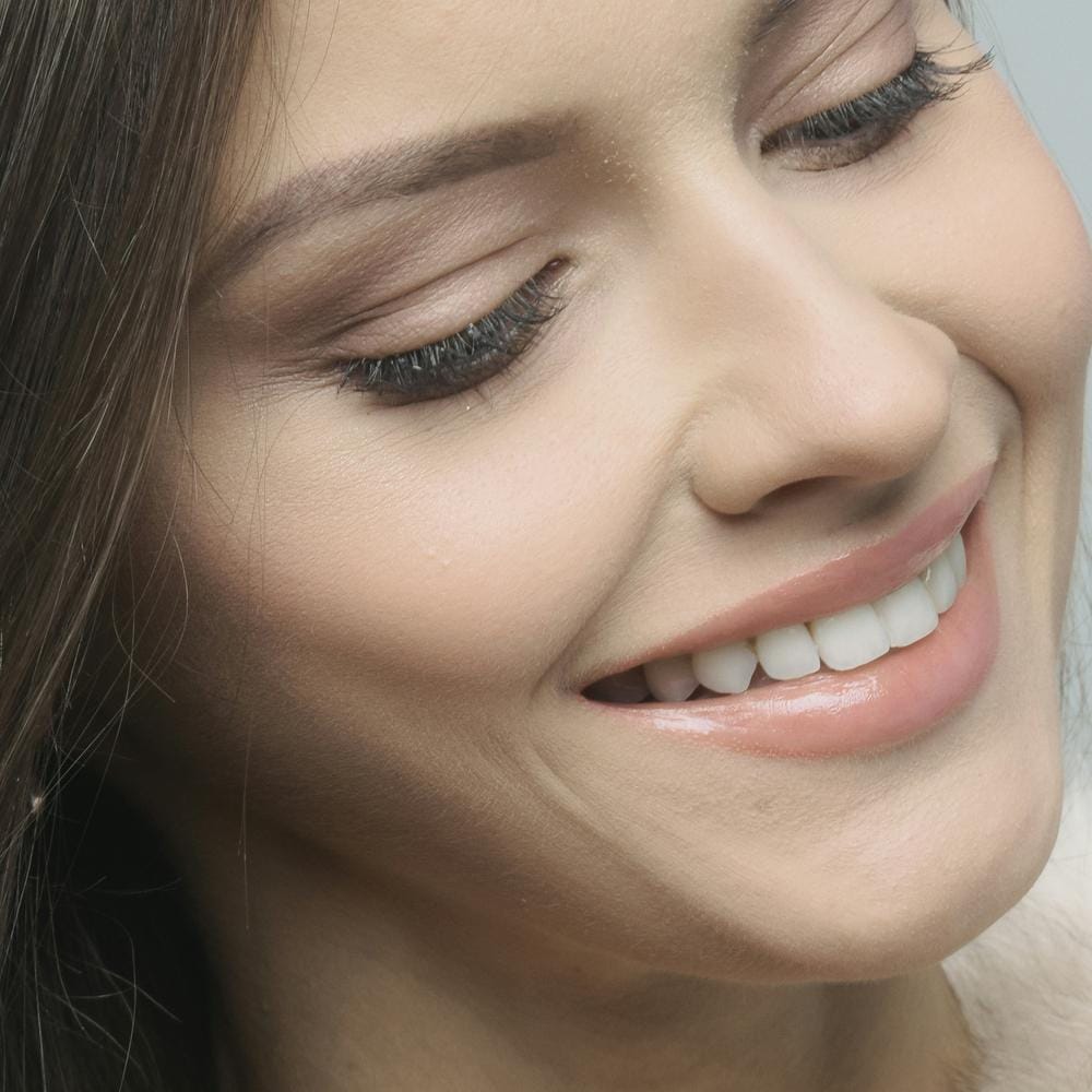 IU what is the average cost of dental implants in the UK